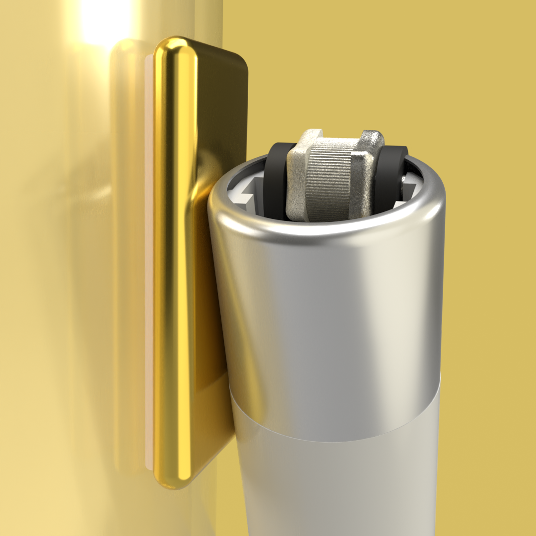 Gold Maglet with lighter attached, side view.