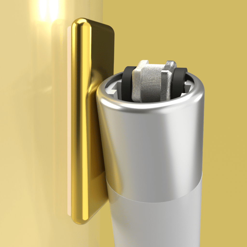 Gold Maglet with lighter attached, side view.